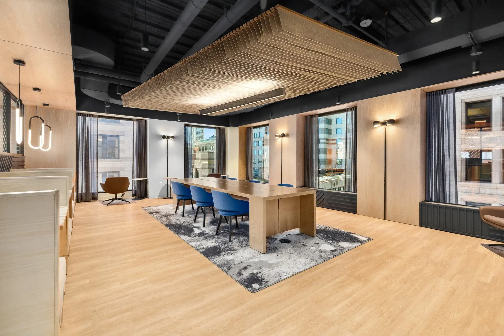 LinkSquares office — boardroom beneath a slatted timber ceiling, with downtown views